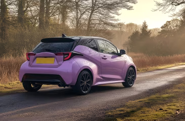 Woman on laptop with MoneySuperMarket logo displayed