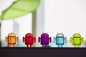 Woman on laptop with MoneySuperMarket logo displayed