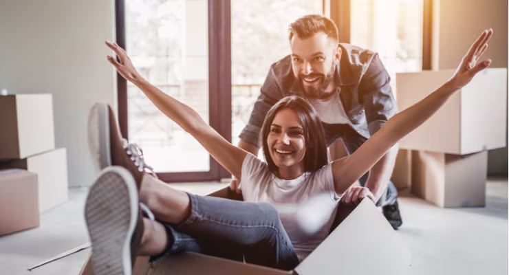 Couple moving into flat
