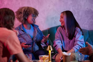 Woman on laptop with MoneySuperMarket logo displayed