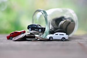 Woman on laptop with MoneySuperMarket logo displayed