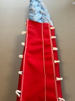 Covers med snørreluk rød