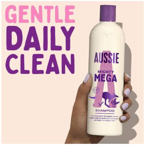 A picture of mighty mega shampoo Bottle in hand and claim gentle daily clean.