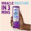 A picture of 3 Minute Miracle Moist Bottle held in hand, with a text: miracle moisture in 3 mins.