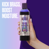 An image of a hand holding Aussie Blonde Hair Hydration Purple Shampoo and a sentence: 'Kick brass, boost moisture'