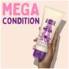 A picture of mighty mega conditioner tube in hand and claim: mega condition