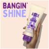 A picture of bangin shine conditioner tube in hand with claim: bangin shine