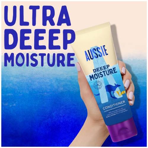 A picture of a shampoo bottle held in hand with a text above: ultra deep moisture.