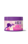 Bottle of Aussie's BOUNCY CURLS butter hair mask