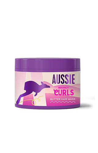 Bottle of Aussie's BOUNCY CURLS butter hair mask