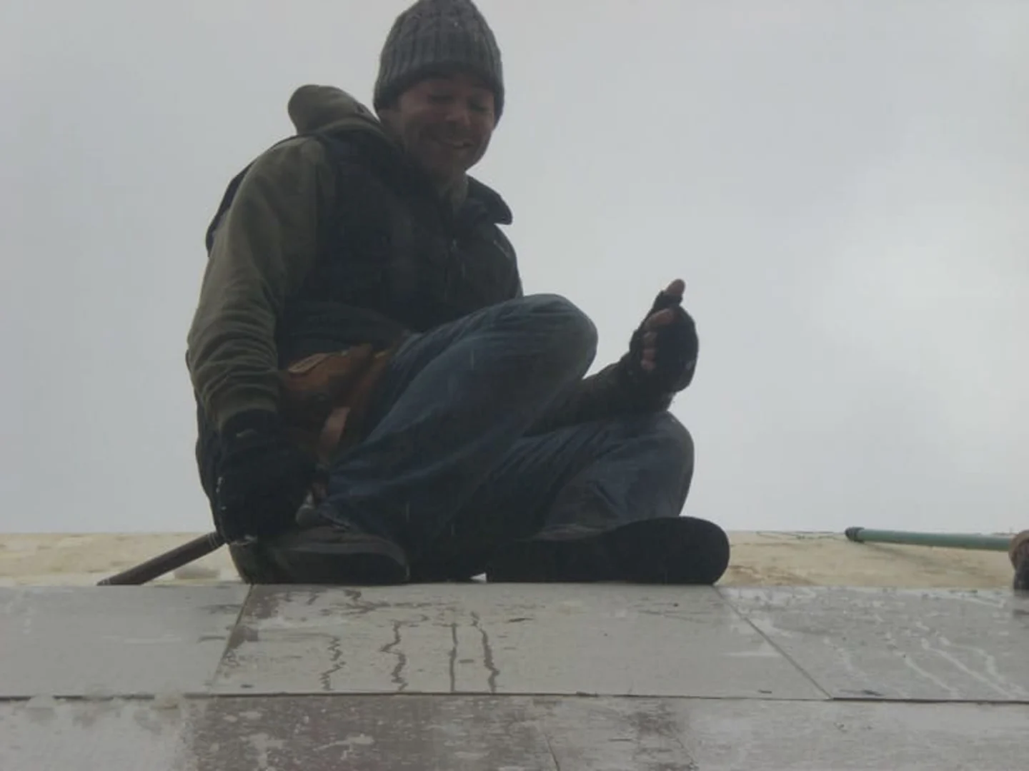 Installing a log cabin with bad weather