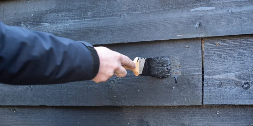 how to treat timber garden building