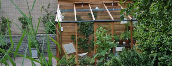 houten tuinkas aan huis maken