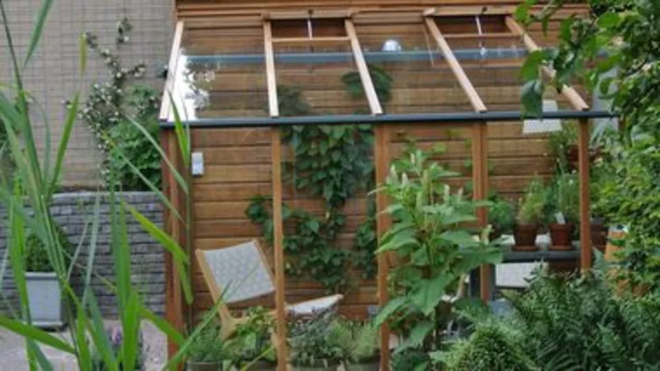 houten tuinkas aan huis maken