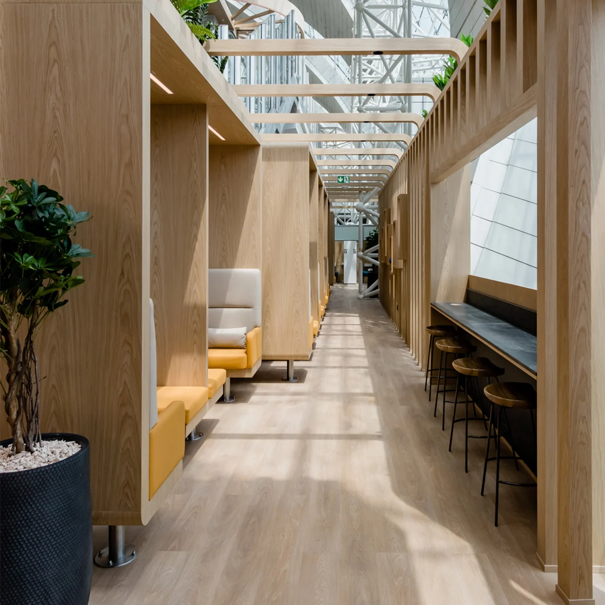 Sleepover Lounge seating area with booths at Dubai Airport, Terminal 3, Concourse B
