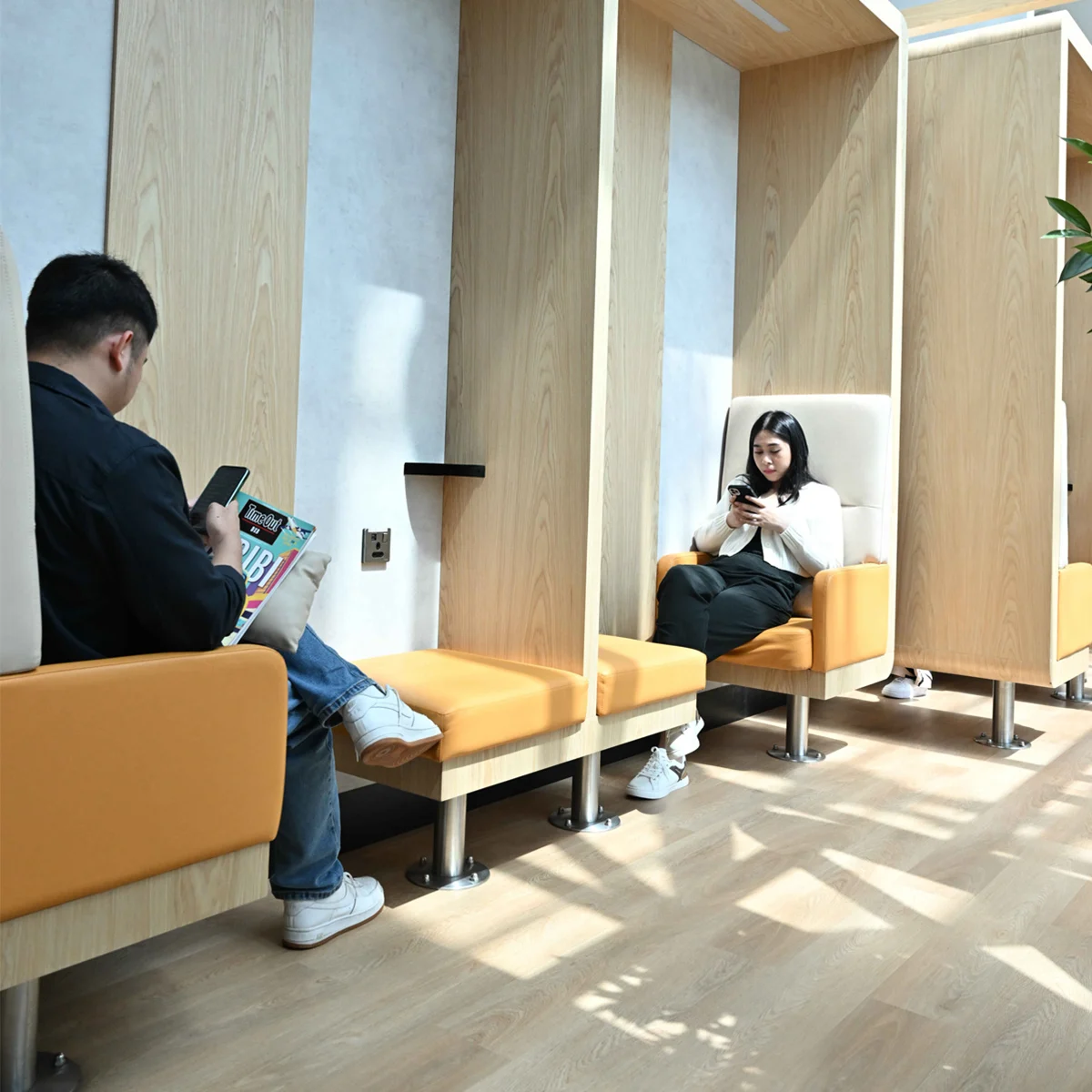Lounge seating area at Terminal 3B with armchairs arranged in a quiet environment.