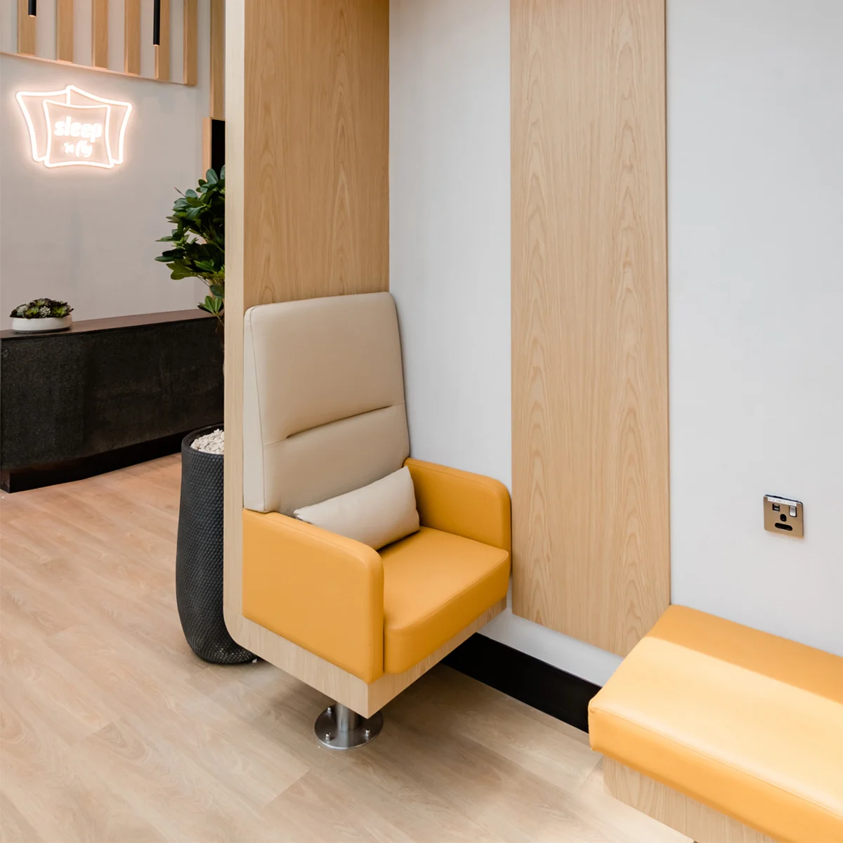 Close-up view of Sleepover Lounge seating area at Dubai Airport, Terminal 3, Concourse B