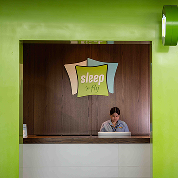 sleep n fly airport lounge reception desk 