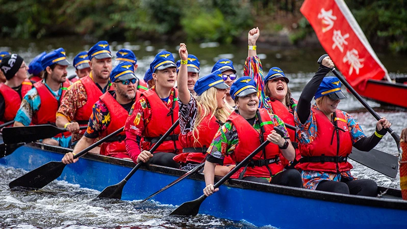 A picture of the Dragon Boat Race team at Birmingham Airport in 2025