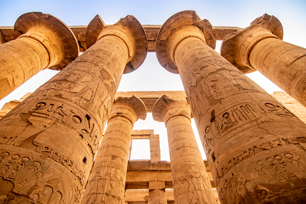 Egypt - KARNAK TEMPLE - Massive columns inside beautiful Egyptian landmark with hieroglyphics, and ancient symbols Landscape