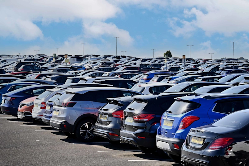This is a picture of Car Park 5 at Birmingham Airport, showing loads of cars parked up consecutively on the surface car parkk