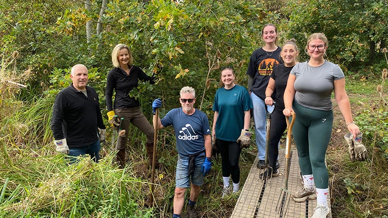 The Property and Commercial Team at Birmingham Airport volunteering at Castle Bromwich Historic Gardens.