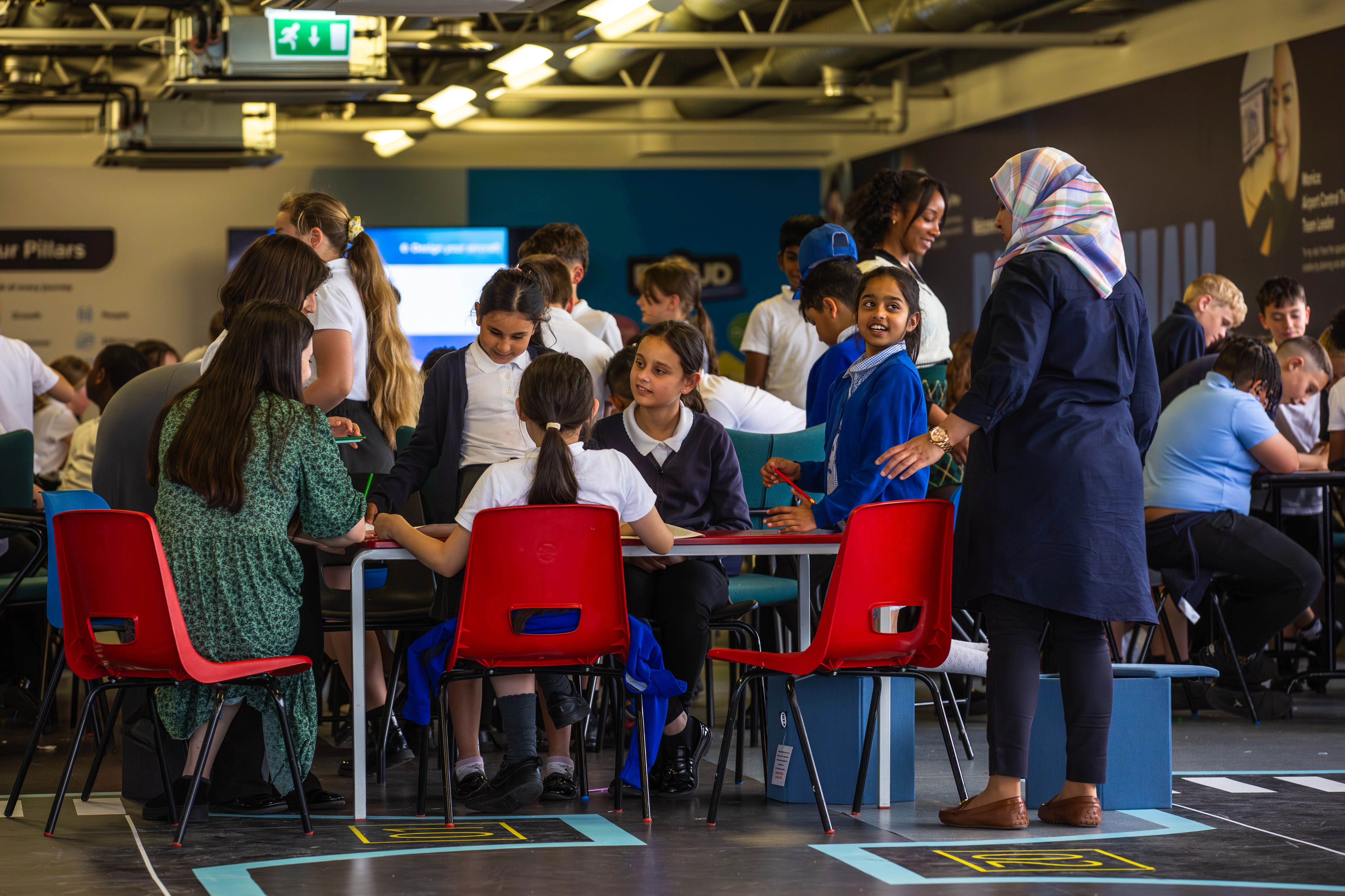Image of children and teachers at an education visit at Birmingham Airport