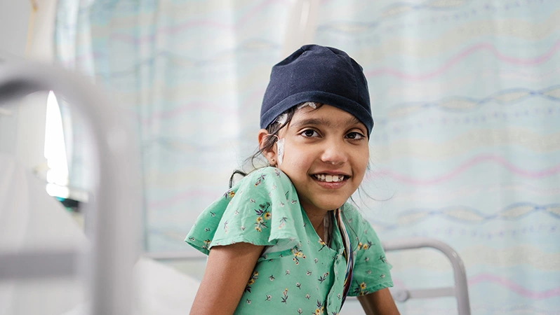 A picture of a child being looked after at Birmingham Children's Hospital