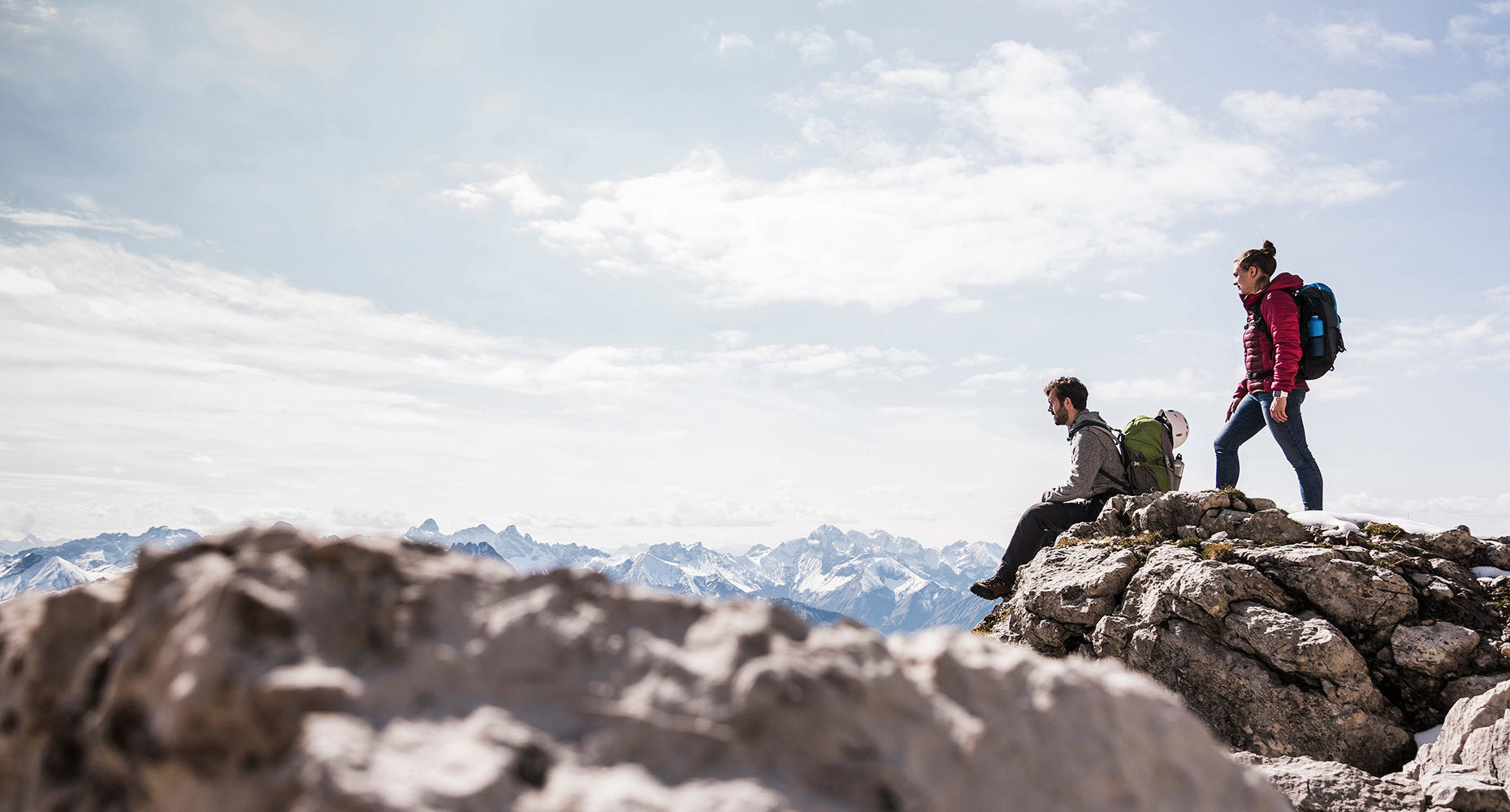 hikers-resting-on-cliff-flipped