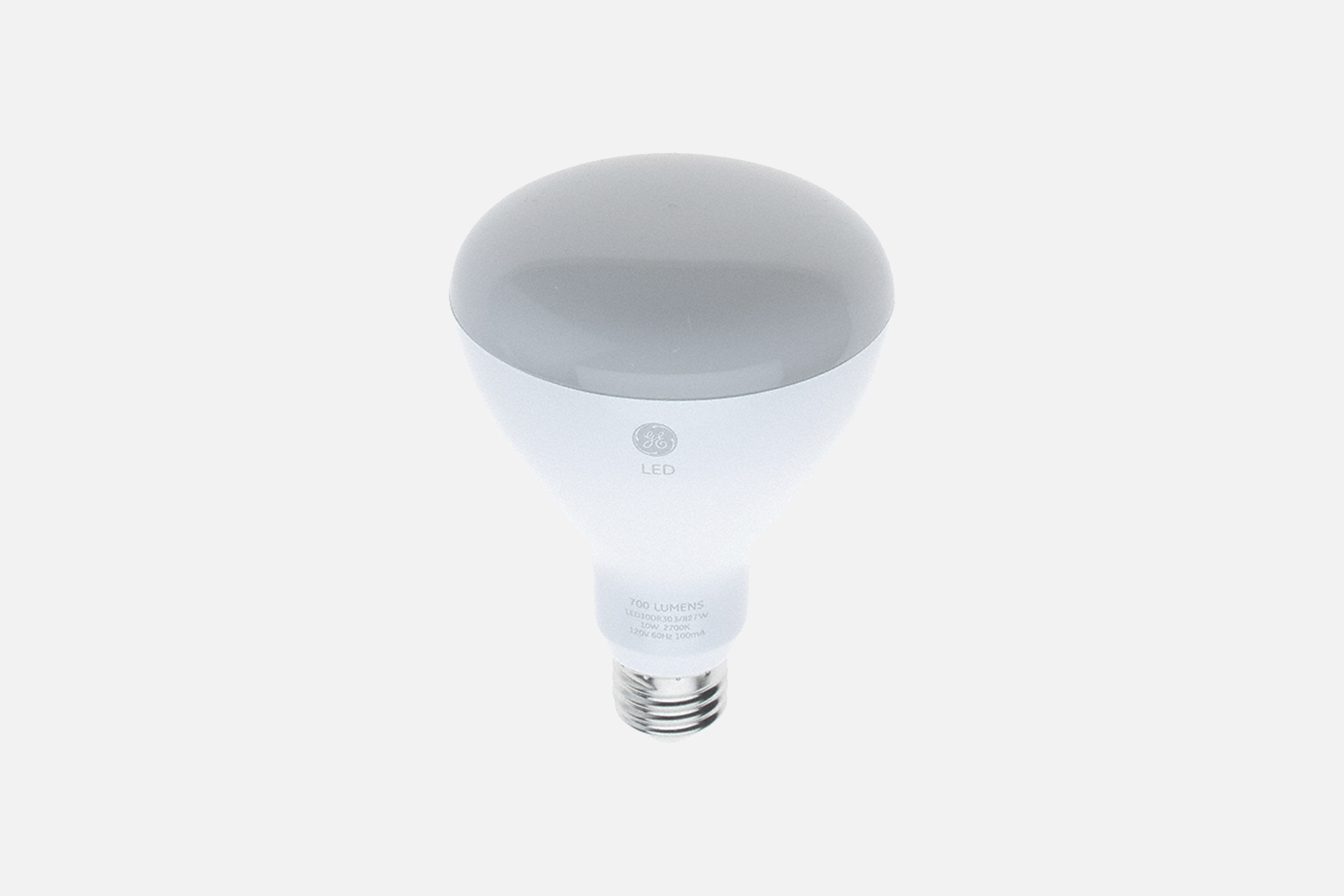 Eco friendly light bulb on a light grey background