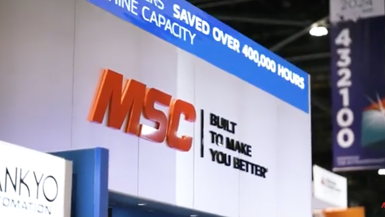 MSC trade show booth with orange logo and tagline Built to Make You Better on white background with blue header banner