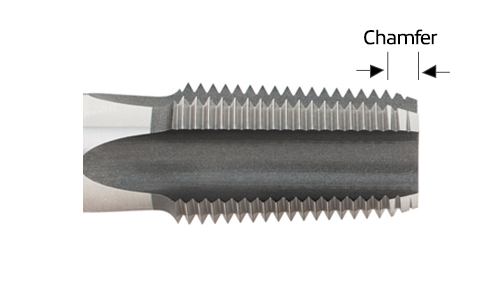 Close-up of the chamfer section of a threading tap, showing the tapered threads at the tip