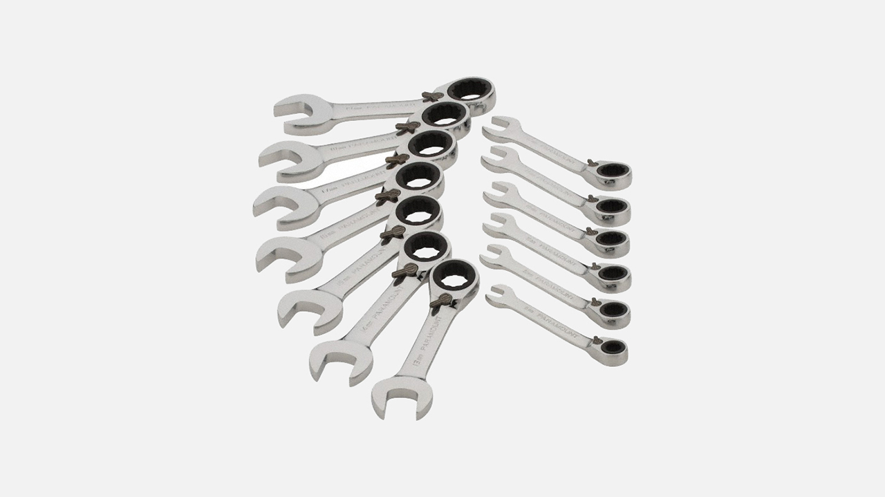 Set of thirteen chrome ratcheting combination wrenches arranged in a fan pattern
