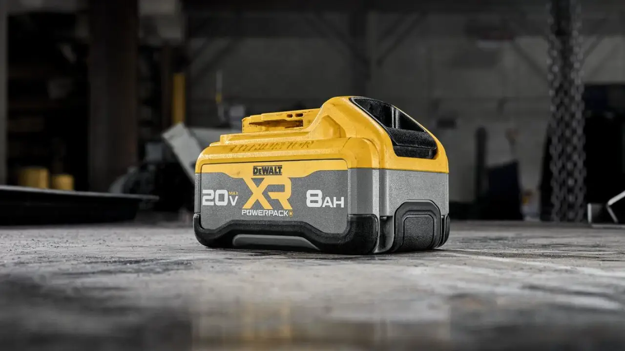 DeWalt 20V XR Powerpack 8AH battery pack in yellow and gray on workshop table