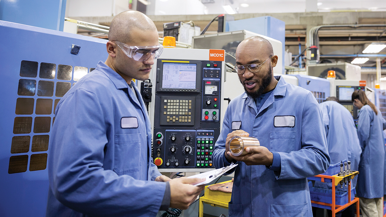 Image of workers discussing