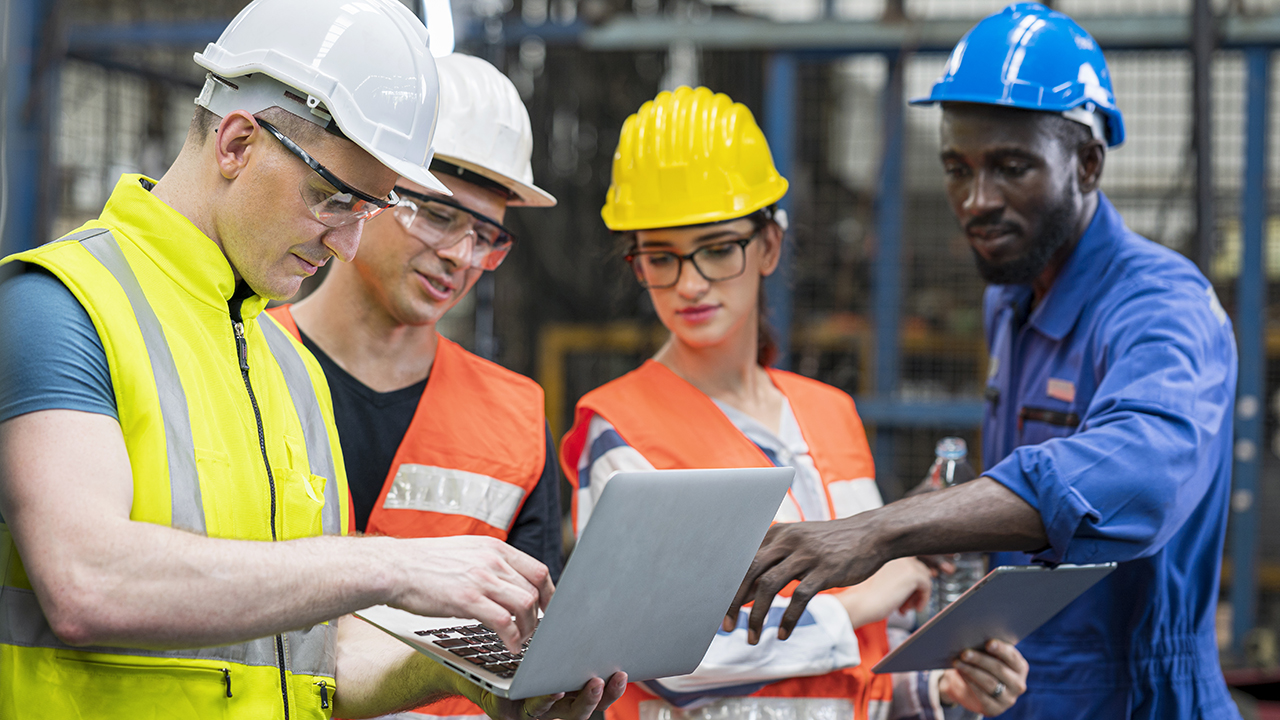 Image of team testing on machine