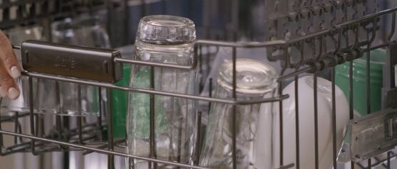 Cloudy glassware on top loading rack of dishwasher