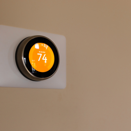 image of a smart heating thermostat at city plumbing