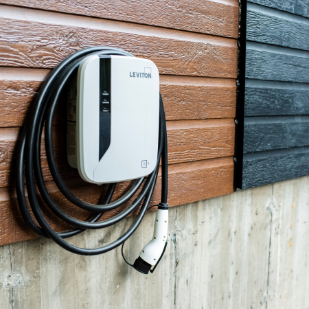 Image of EV charger on the wall of a property at city plumbing