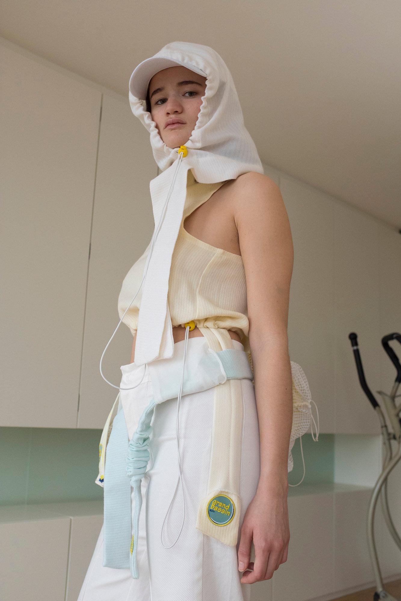 Collection 2020 - wool-hood-cap-boule-yellow-honeycomb-trousers-tennis-mesh-bag-detail-modular-2000x1333.jpg