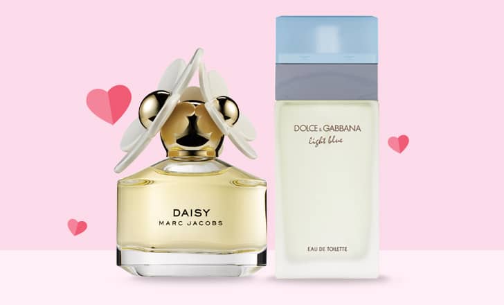 Bottles of Daisy by Marc Jacobs and Light Blue by Dolce & Gabbana fragrances.