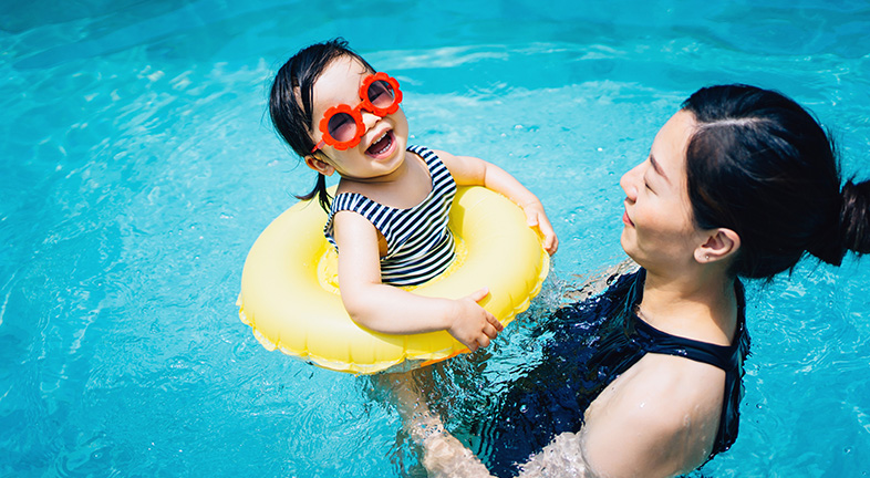 Mom and daughter in the swimming pool
