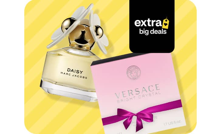 A bottle of Daisy by Marc Jacobs and a box of Versace Bright Crystal fragrances.