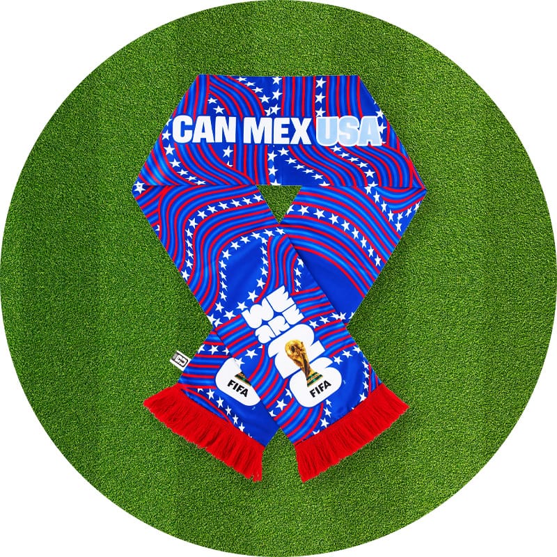 Red, white and blue soccer scarf on a green grass background with wavy stripe patterns and stars, featuring text "Can Mex USA" and FIFA World Cup trophy graphics at the end