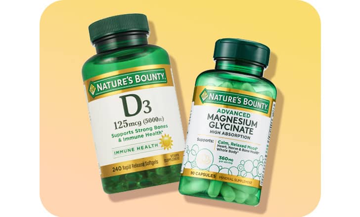 Bottles of Nature's Bounty D 3 and Magnesium Glycinate supplements.