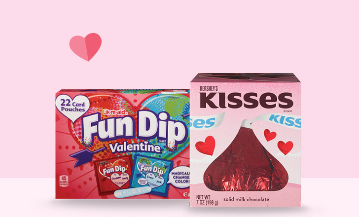 A box of Fun Dip Valentine candy and a boxed single large Hershey's Kisses candy