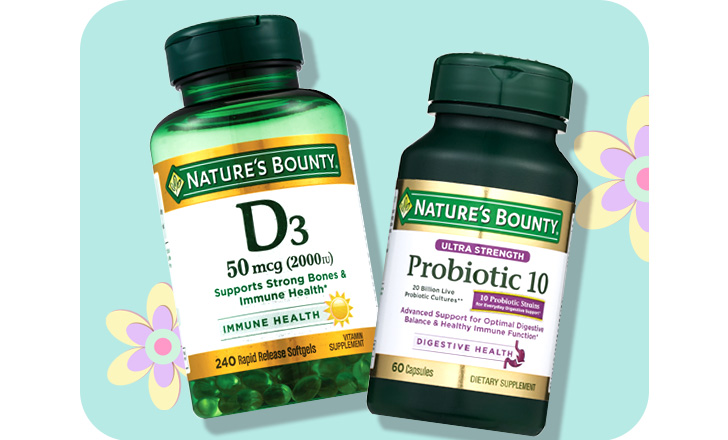 Nature's Bounty D3 and Probiotic 10 supplements against a pastel green background with pastel-colored flowers