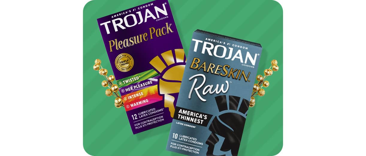 Boxes of Trojan Pleasure Pack and Bareskin Raw condoms.