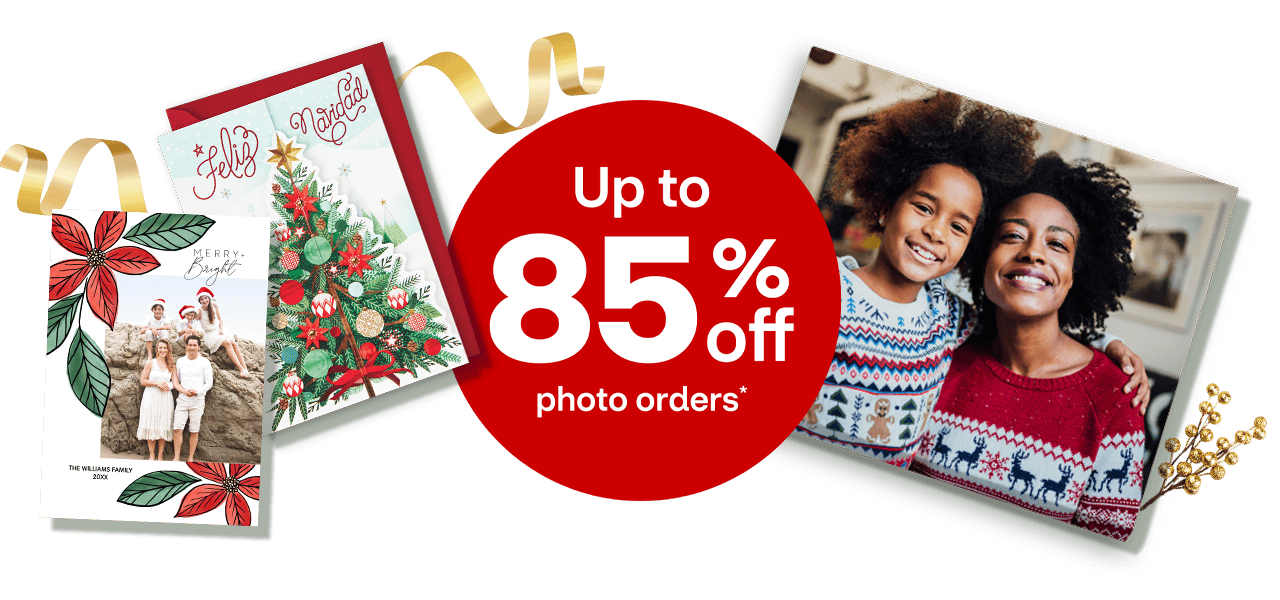 Up to 85 percent off photo orders; a photo holiday card, a holiday card in Spanish and a canvas print of a holiday photo.