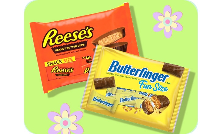 Reese's peanut butter cups and Butterfingers against a green background with pastel-colored flowers